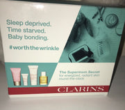 Clarins 4pc Travel Set~Multi-Active Day/Flash Balm/Hand &Nail Cream/Tonic Oil